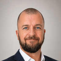 This is a picture of Sasha Zunic, a speaker at the conference