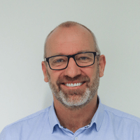 This is a picture of Jason Juretic, a speaker at the conference