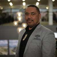This is a picture of Jordan Robertson, a speaker at the conference