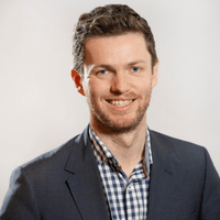 This is a picture of Michael Carmody, a speaker at the conference