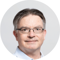 Headshot of Professor Stephen Whelan. He is wearing glasses and a blue collared shirt.