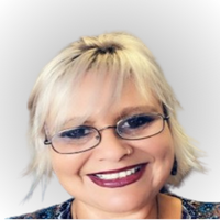 This is a picture of Tina Ugle a speaker at the conference