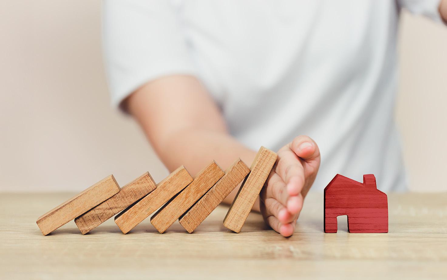 This is a picture of some blocks and a wooden house